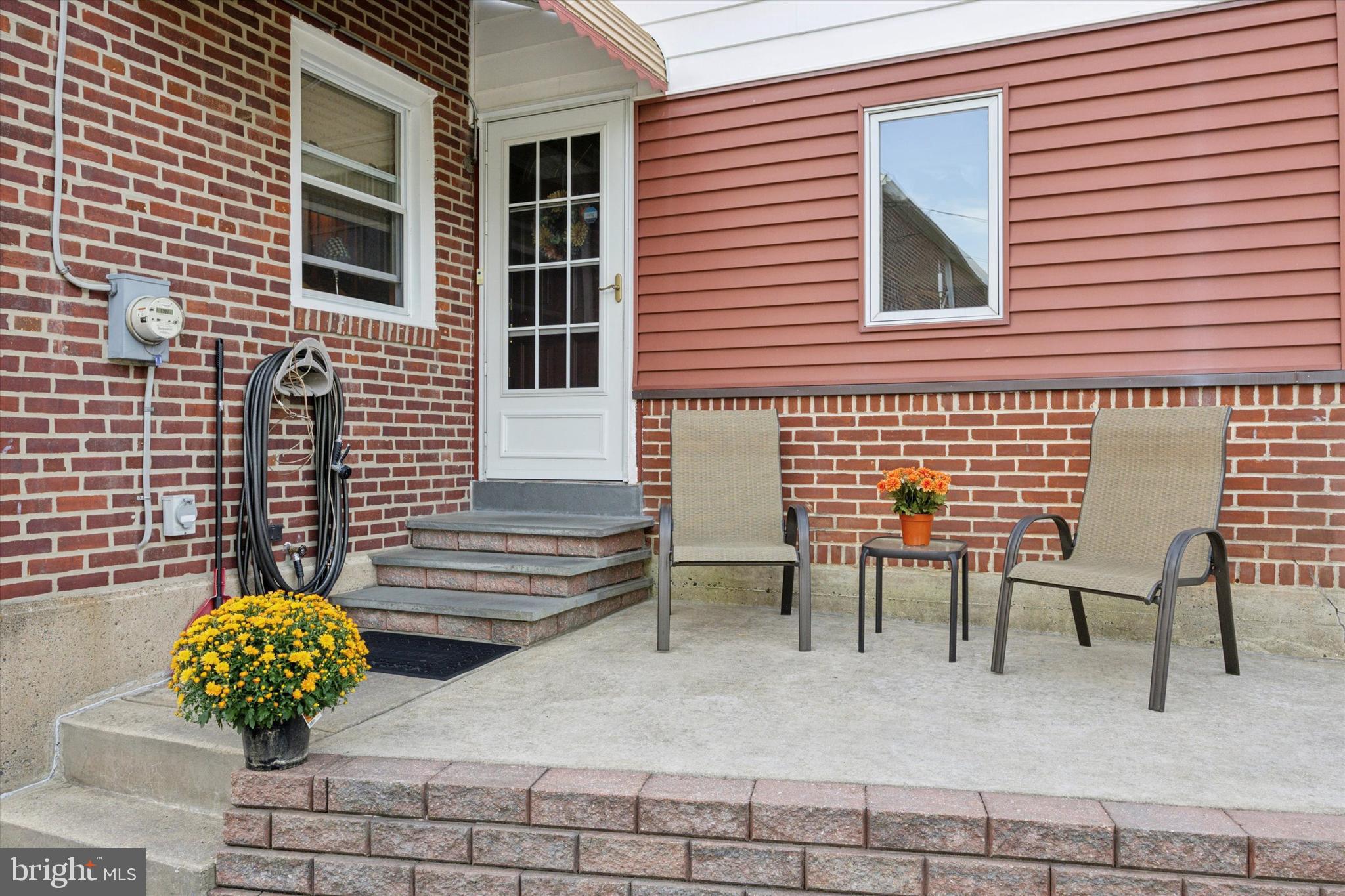 730 Dutton Circle Springfield, PA 19064 - Photo 14 of 38 a view of a chairs and table in a back yard