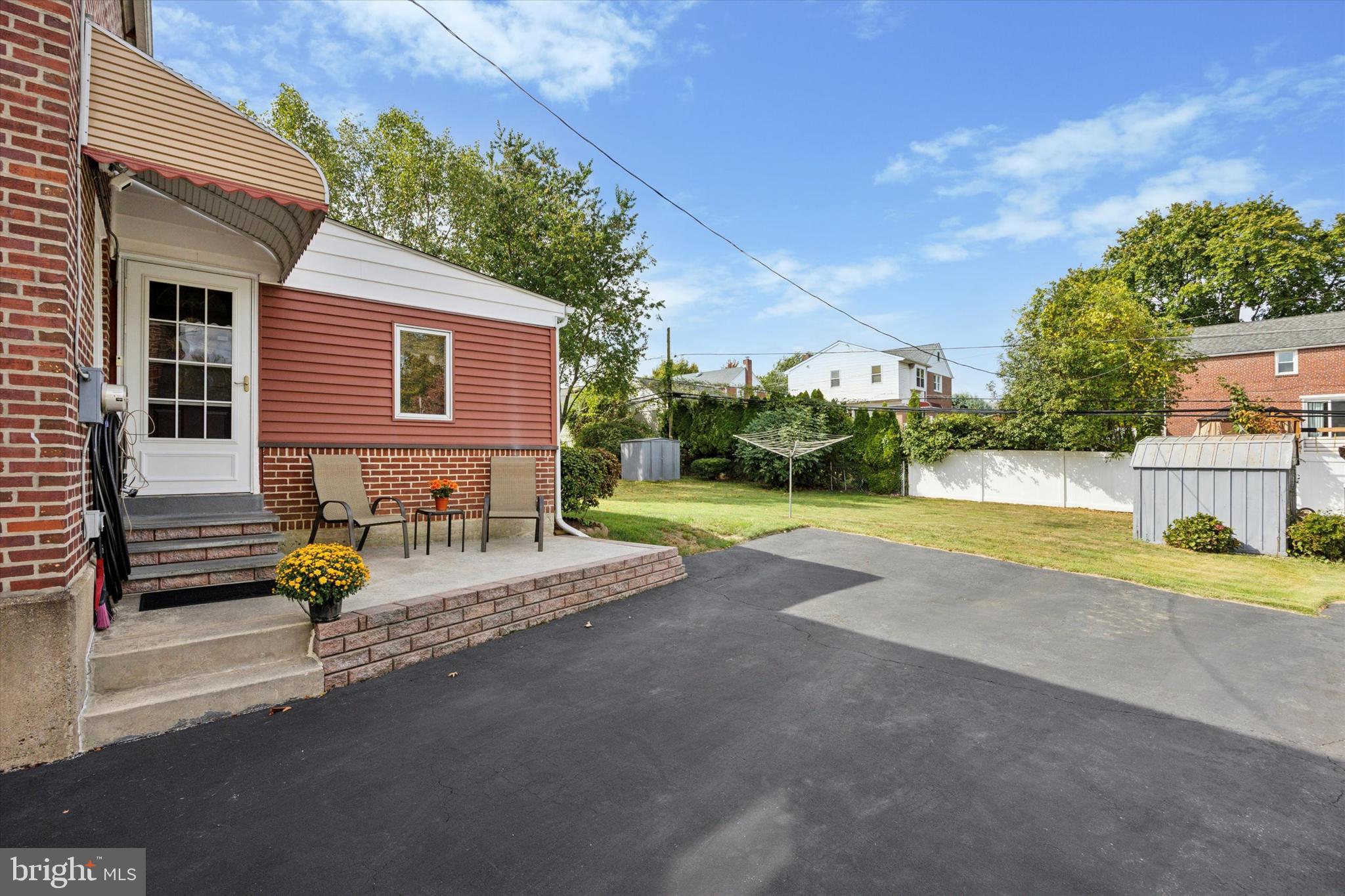 730 Dutton Circle Springfield, PA 19064 - Photo 17 of 38 a view of backyard with swimming pool and seating space