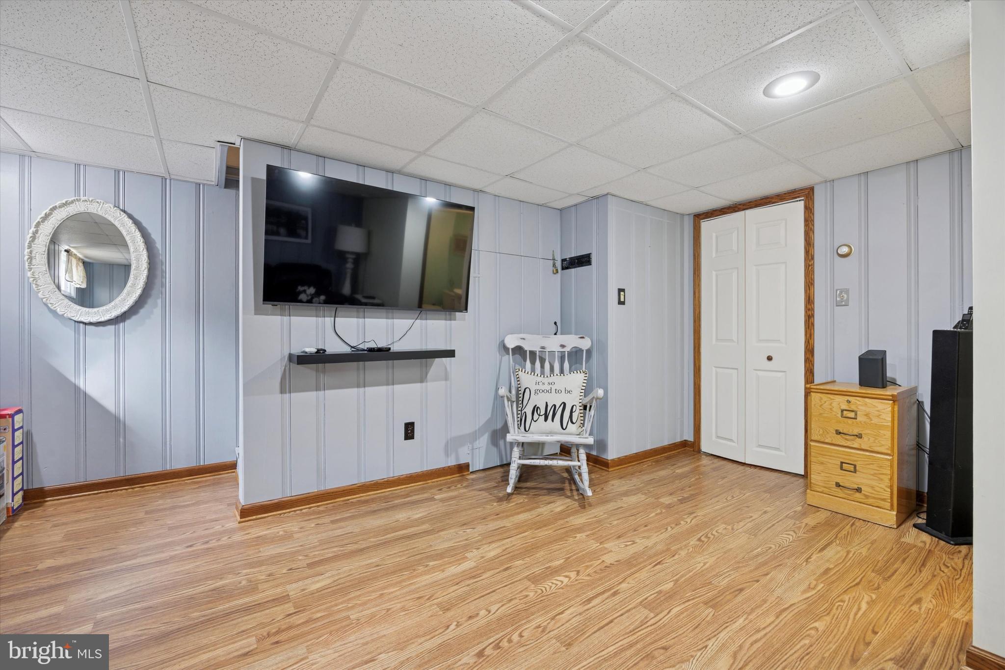 730 Dutton Circle Springfield, PA 19064 - Photo 27 of 38 a view of living room kitchen with stainless steel appliances cabinets and flat screen tv