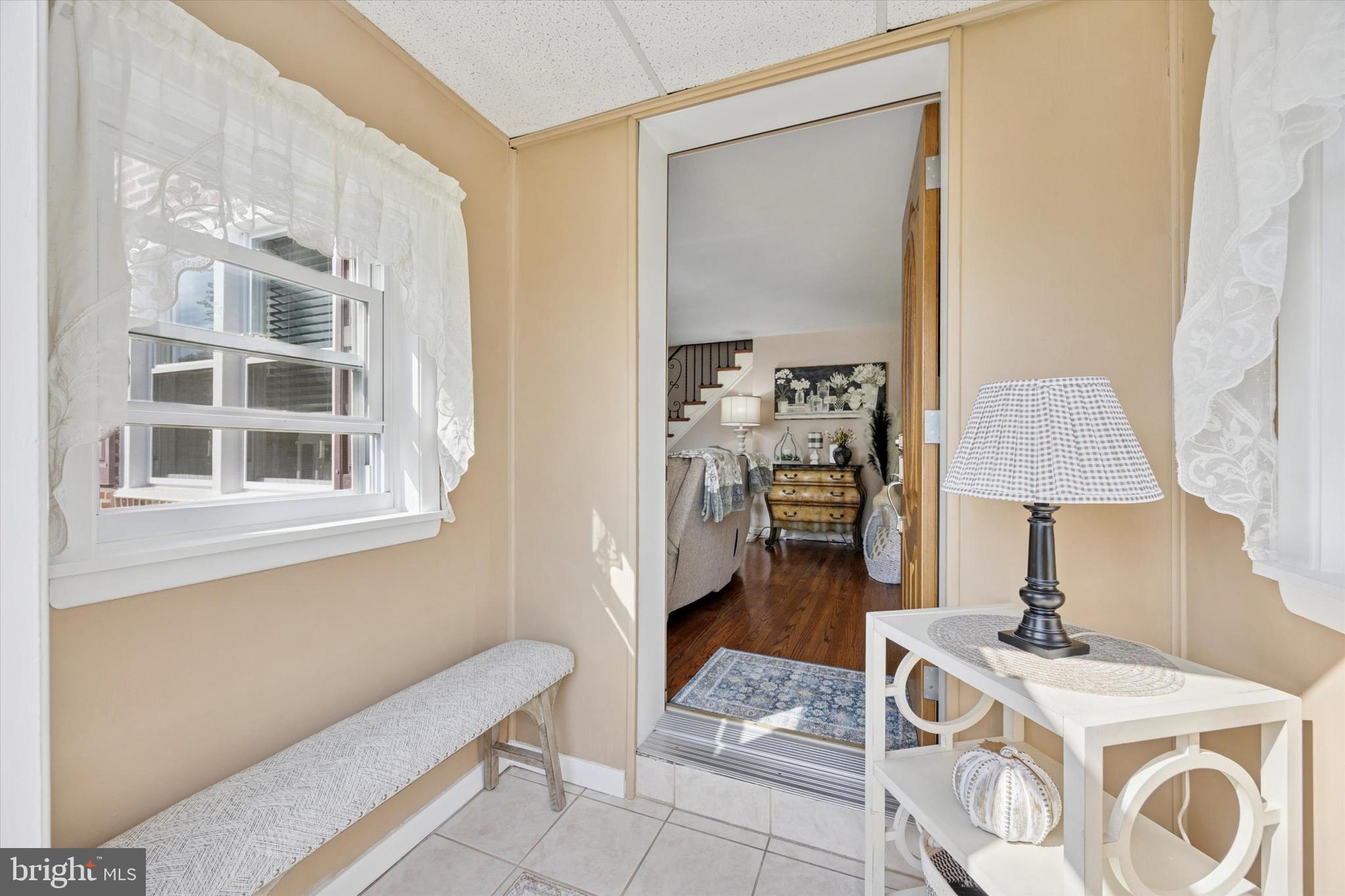 730 Dutton Circle Springfield, PA 19064 - Photo 3 of 38 a living room with a couch and a table