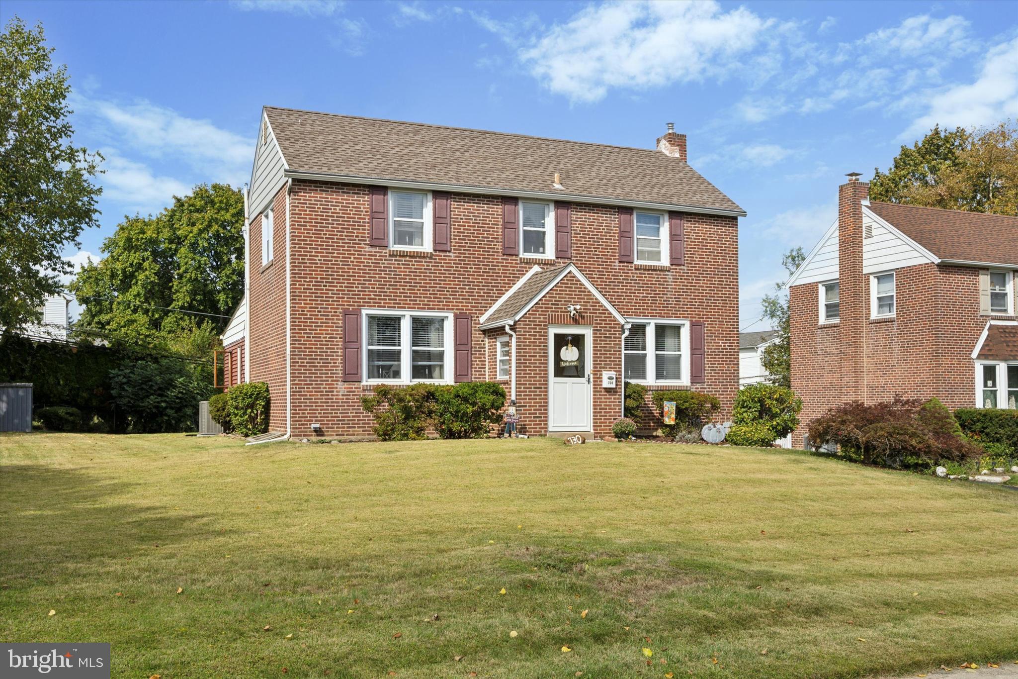 730 Dutton Circle Springfield, PA 19064 - Photo 33 of 38 a front view of a house with a yard