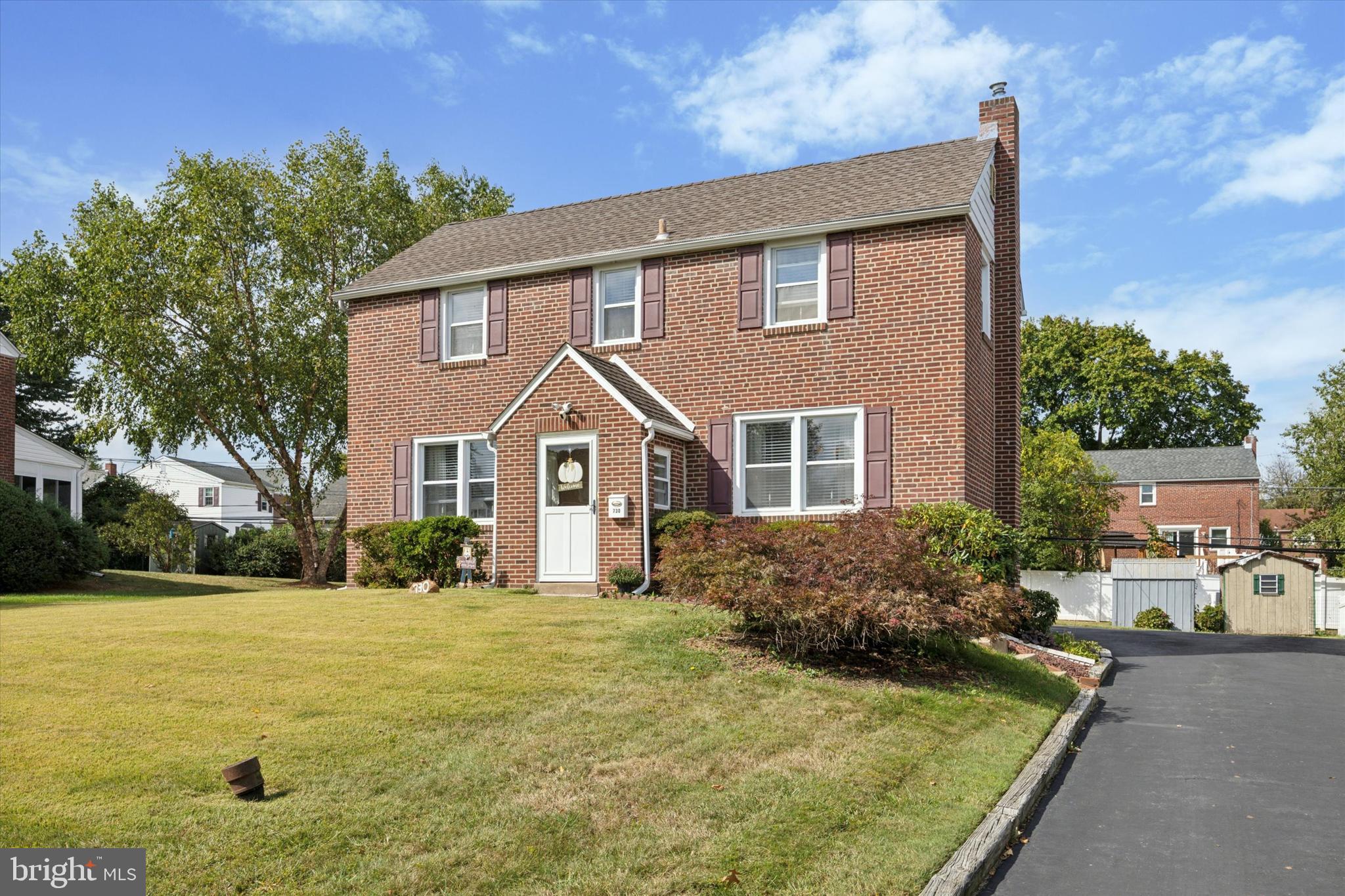 730 Dutton Circle Springfield, PA 19064 - Photo 34 of 38 a front view of a house with a yard
