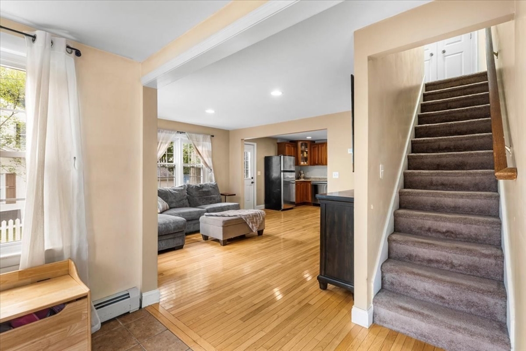 20 Cooks Lane Bellingham, MA 02019 - Photo 3 of 21 a view of a living room and entryway