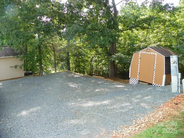 a view of a yard with a garage