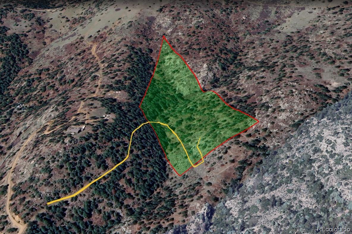 0 Raven Gulch Road Indian Hills, CO 80454 - Photo 14 of 21 a backyard of a house