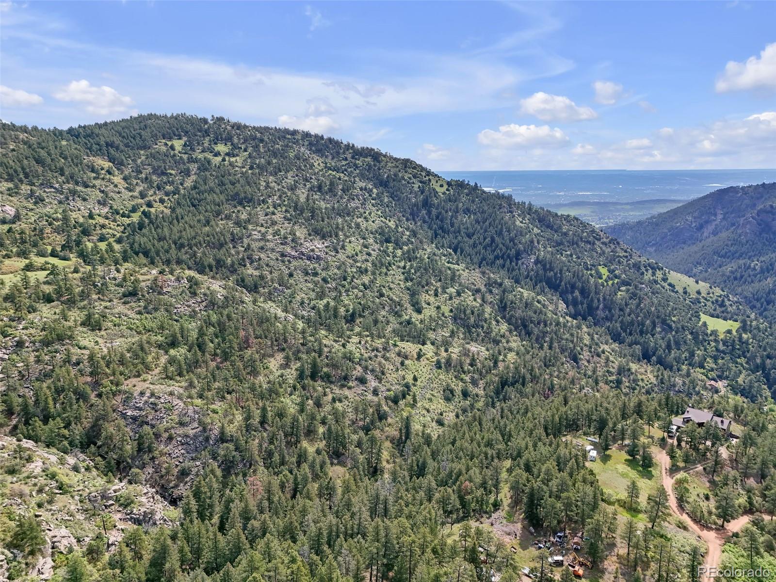 0 Raven Gulch Road Indian Hills, CO 80454 - Photo 19 of 21 a view of a city