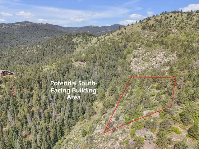 a view of mountain with trees