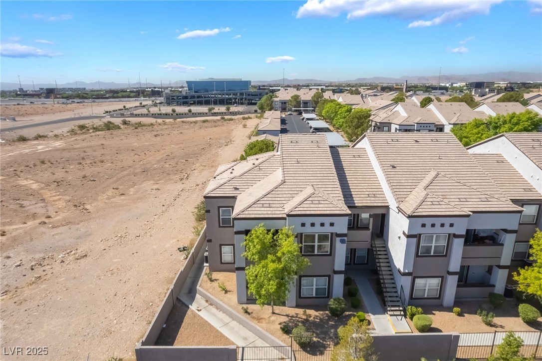 7255 West Sunset Road, Unit 1148 Las Vegas, NV 89113 - Photo 54 of 62 Aerial view of residential area with a mountainous