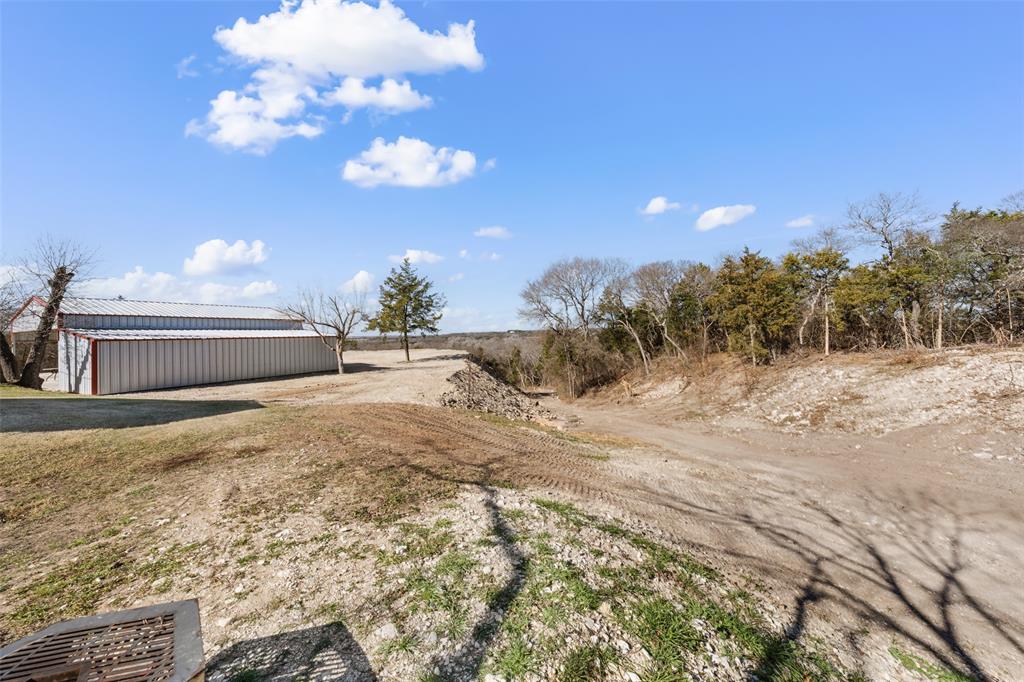 162 High Ridge Drive Bruceville, TX 76630 - Photo 33 of 40 a view of a house with a yard