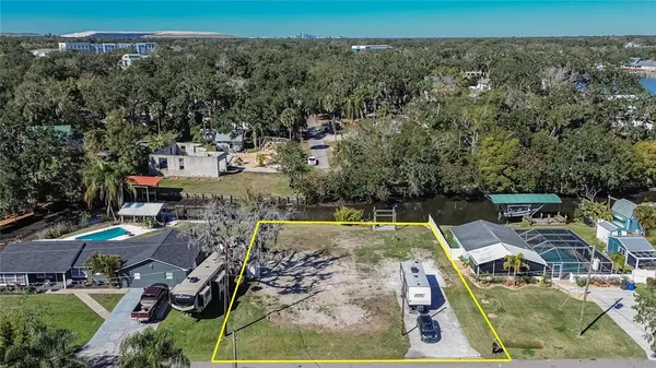 an aerial view of houses with outdoor space