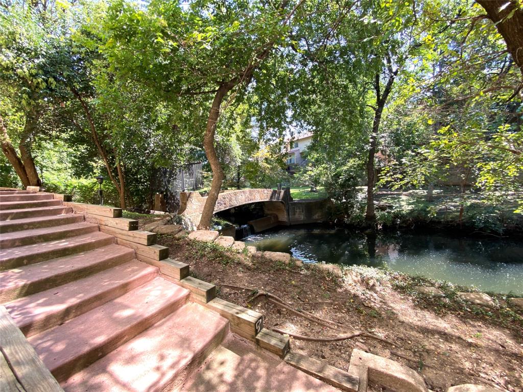 4859 Cedar Springs Road, Unit 337 Dallas, TX 75219 - Photo 14 of 20 a view of a lake with houses