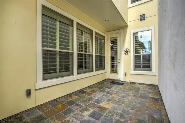 a view of swimming pool with a garden and trees