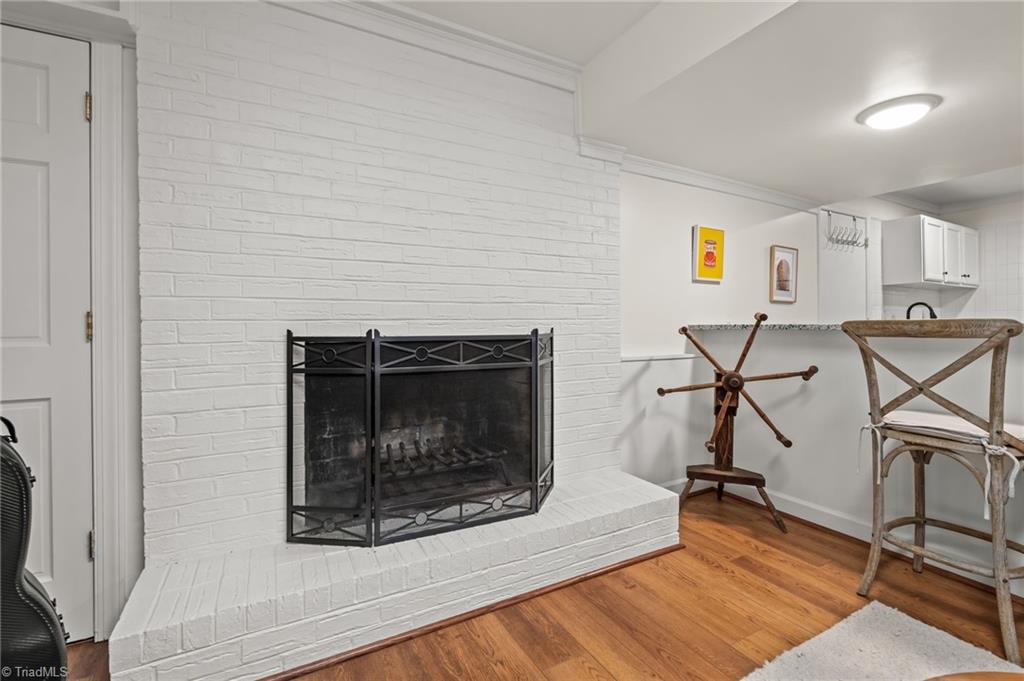 2786 Robinhood Road Winston-Salem, NC 27106 - Photo 19 of 26 Wood burning fireplace in baseemnt