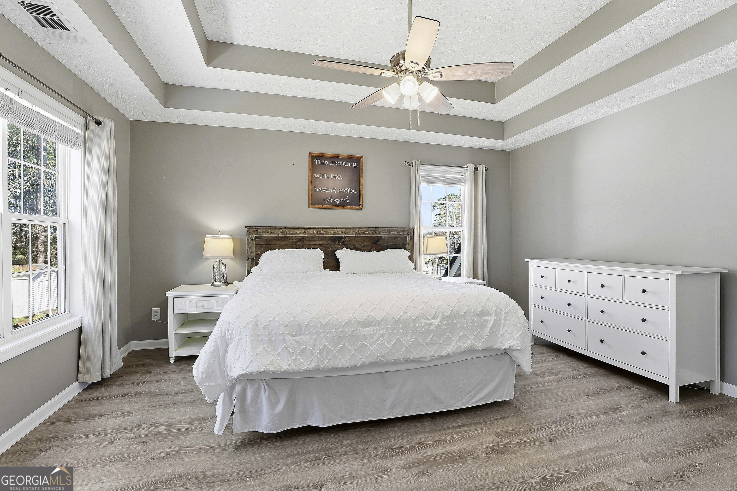 320 Emerald Way Senoia, GA 30276 - Photo 30 of 57 a bedroom with a bed and a dresser