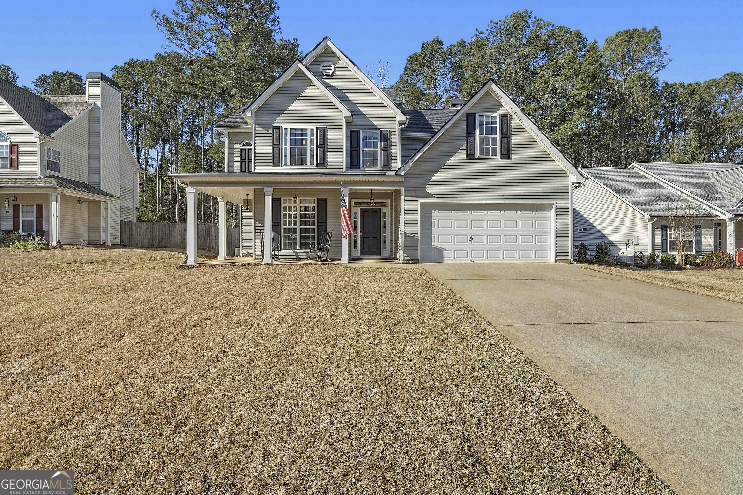 320 Emerald Way Senoia, GA 30276 - Photo 3 of 57 front view of a house with a street