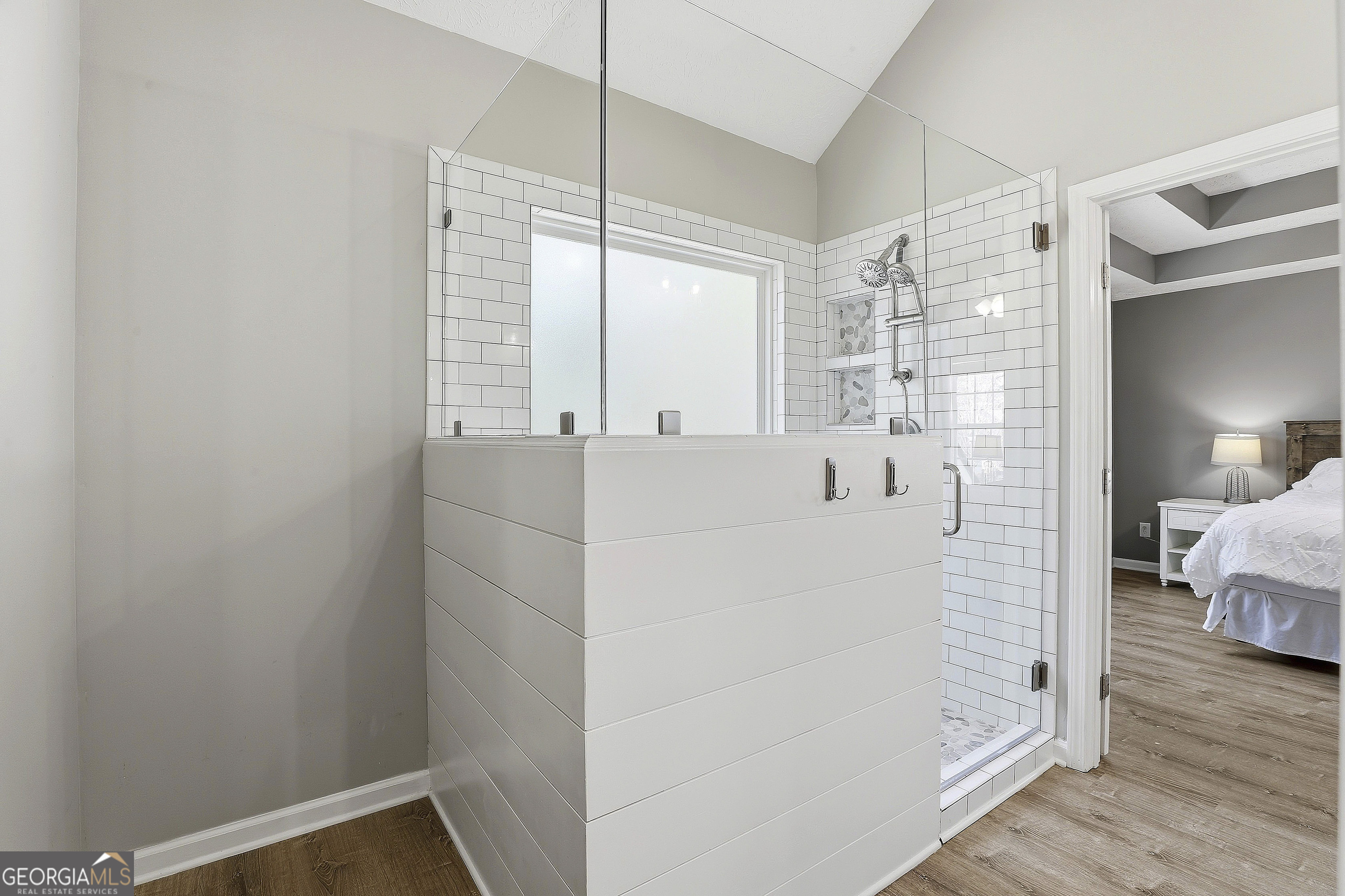 320 Emerald Way Senoia, GA 30276 - Photo 33 of 57 a bathroom with a bathtub and a shower