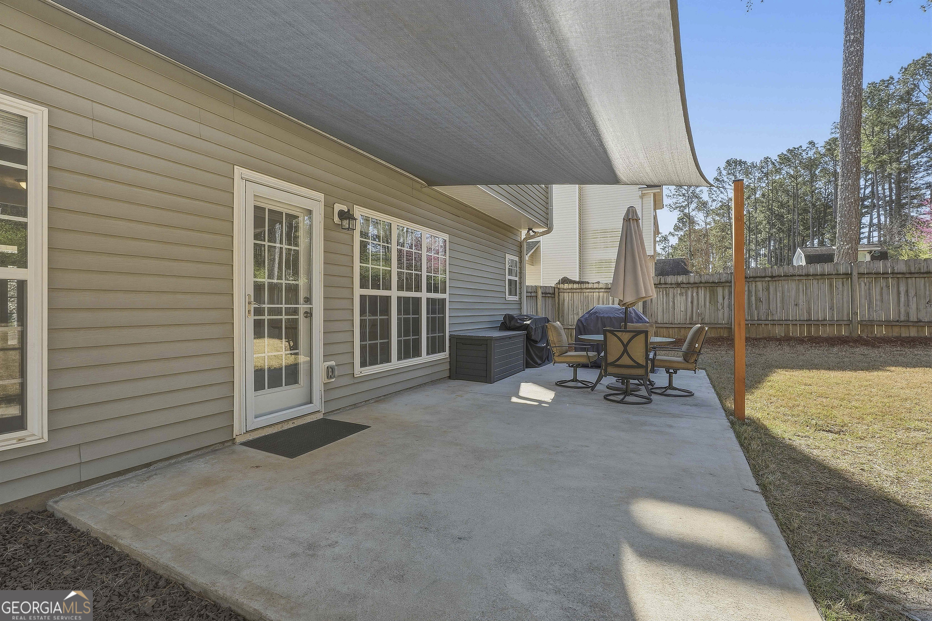 320 Emerald Way Senoia, GA 30276 - Photo 43 of 57 a view of a house with outdoor seating area