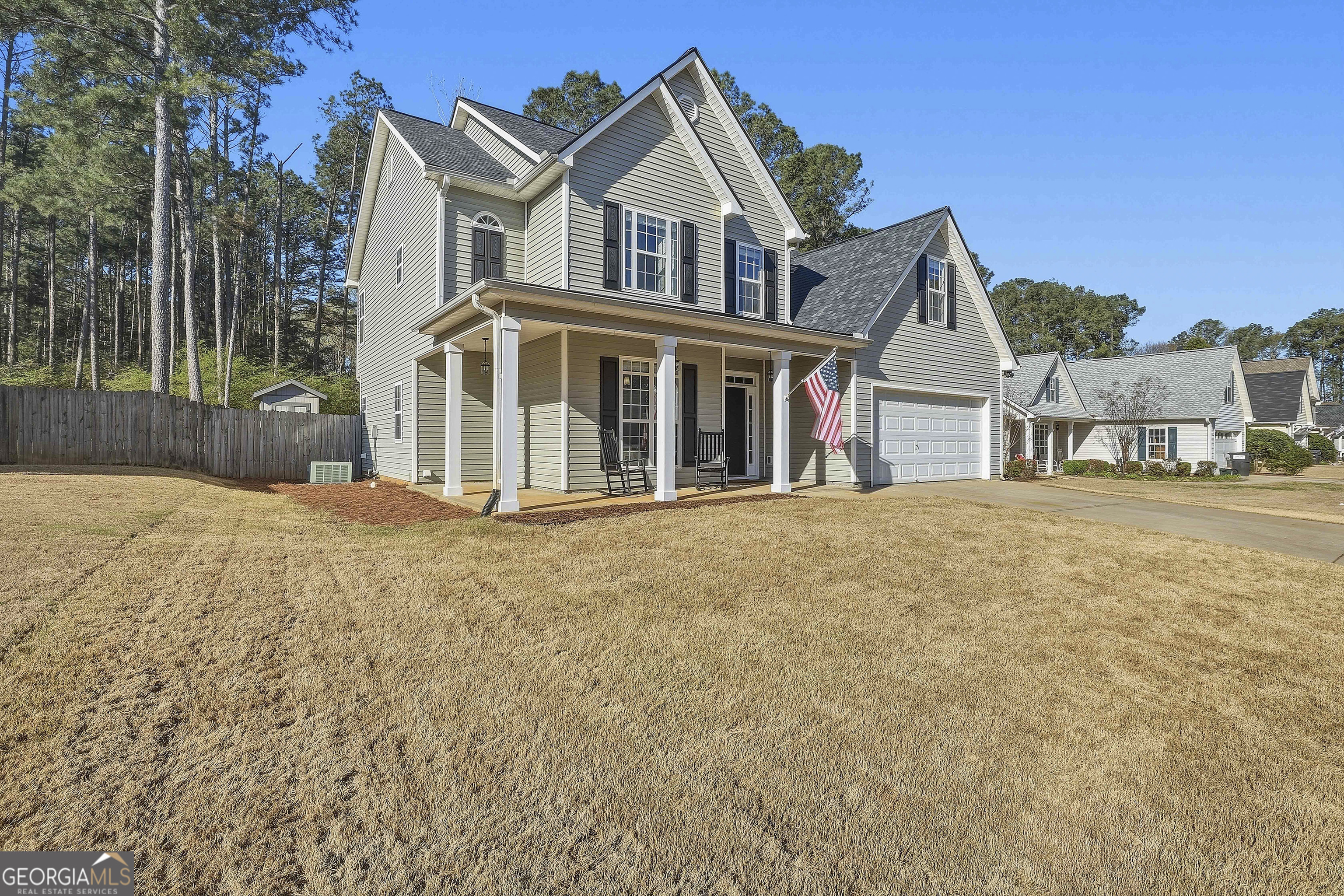 320 Emerald Way Senoia, GA 30276 - Photo 5 of 57 a front view of a house with a garden