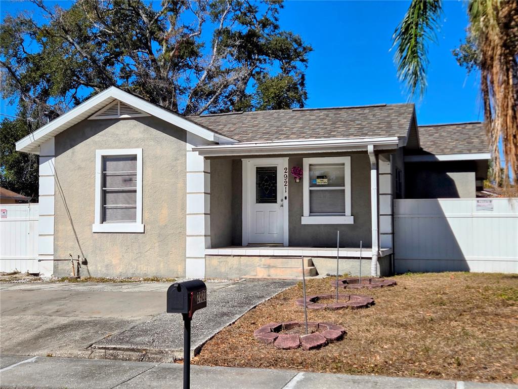 2921 West Walnut Street Tampa, FL 33607 - Photo 1 of 12 a front view of a house with garden