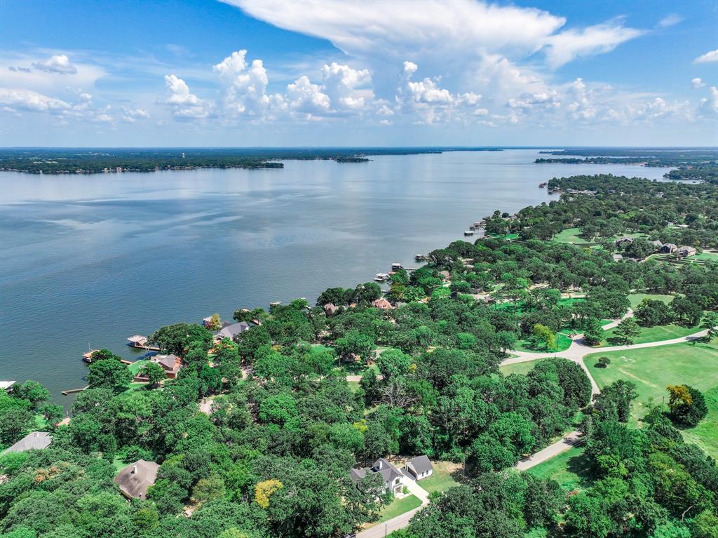 Tbd Inner Circle Tool, TX 75143 - Photo 12 of 24 Aerial view of property and surrounding area with a nearby body of water