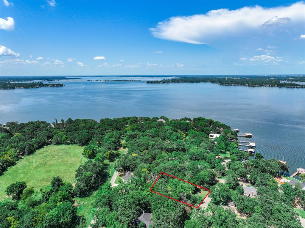 Tbd Inner Circle Tool, TX 75143 - Photo 15 of 24 Aerial view of property and surrounding area featuring property boundaries highlighted and a large body of water