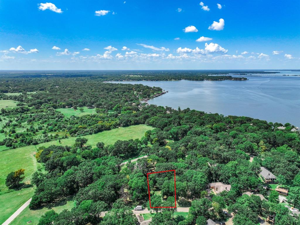 Tbd Inner Circle Tool, TX 75143 - Photo 17 of 24 Aerial view of property's location with property boundaries highlighted and a large body of water