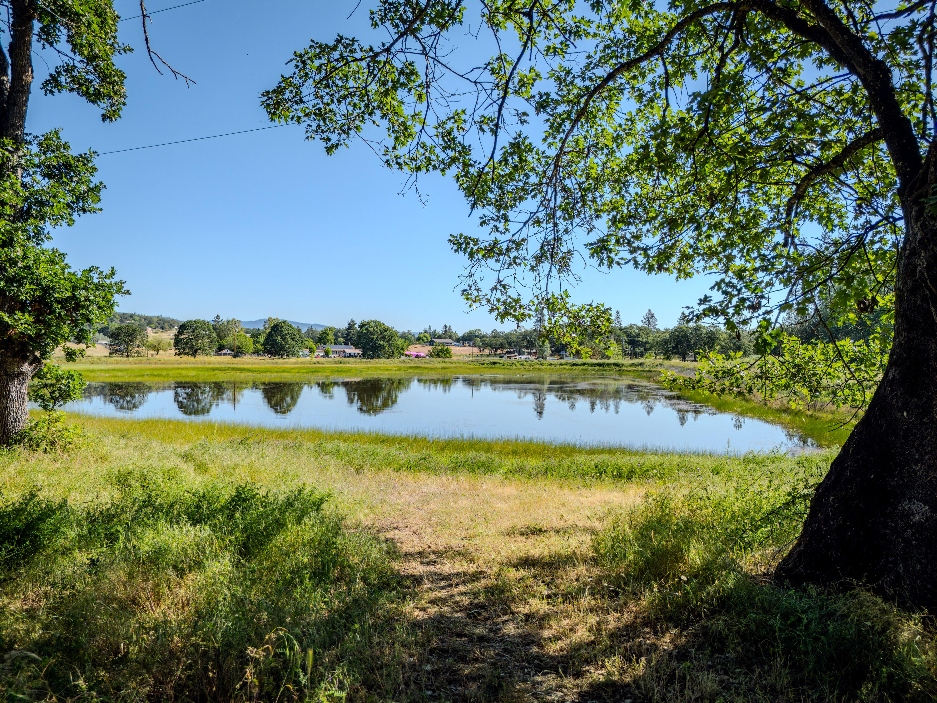 11775 Michael Road White City, OR 97503 - Photo 5 of 17 a view of a swimming pool with an outdoor space and seating area