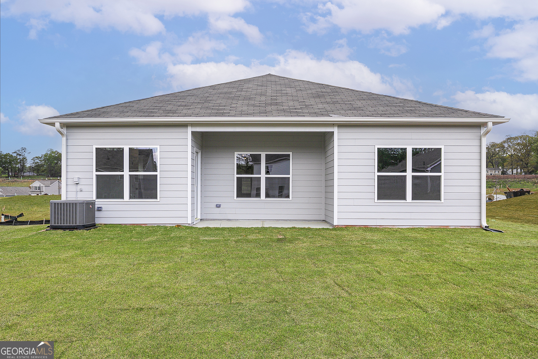 217 Darter Court Hoschton, GA 30548 - Photo 3 of 23 a house that has a big yard