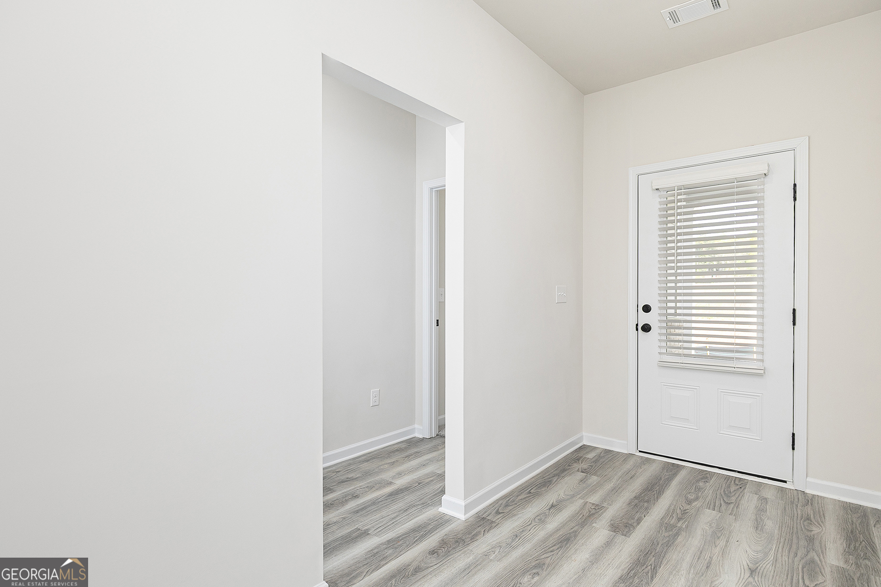 217 Darter Court Hoschton, GA 30548 - Photo 4 of 23 a view of an empty room