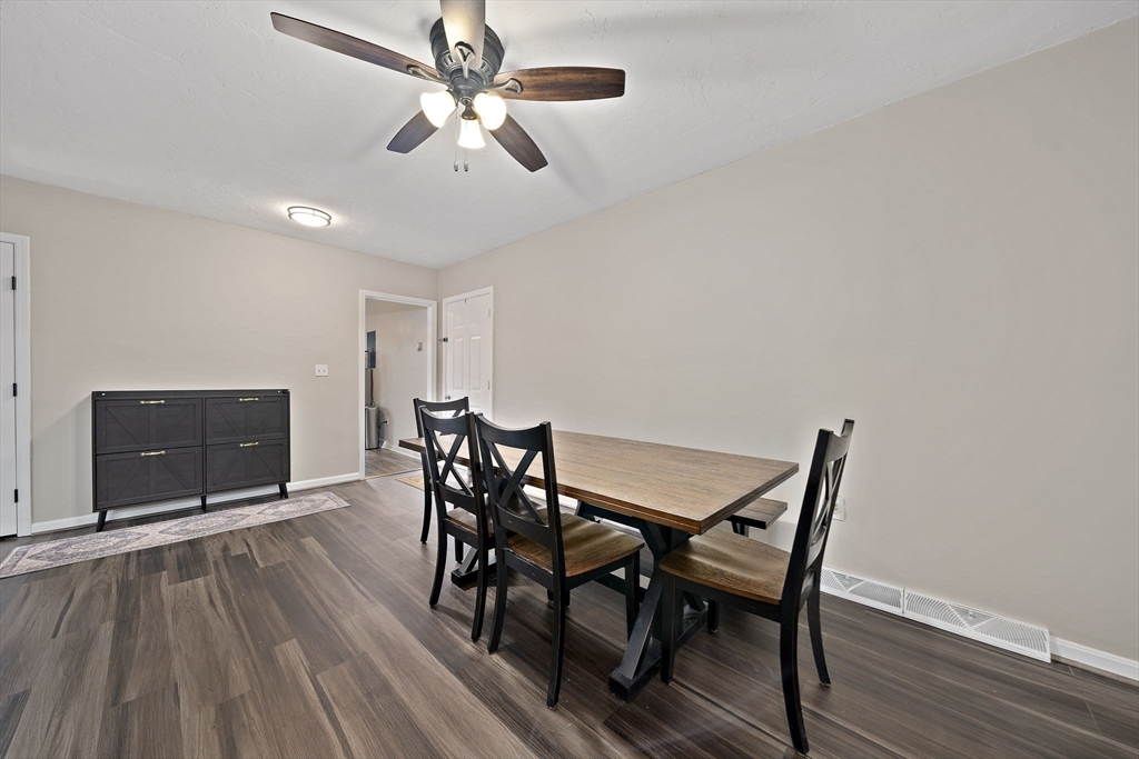 22 Union Square, Unit 22 Randolph, MA 02368 - Photo 13 of 28 a view of a dining room with furniture and wooden floor