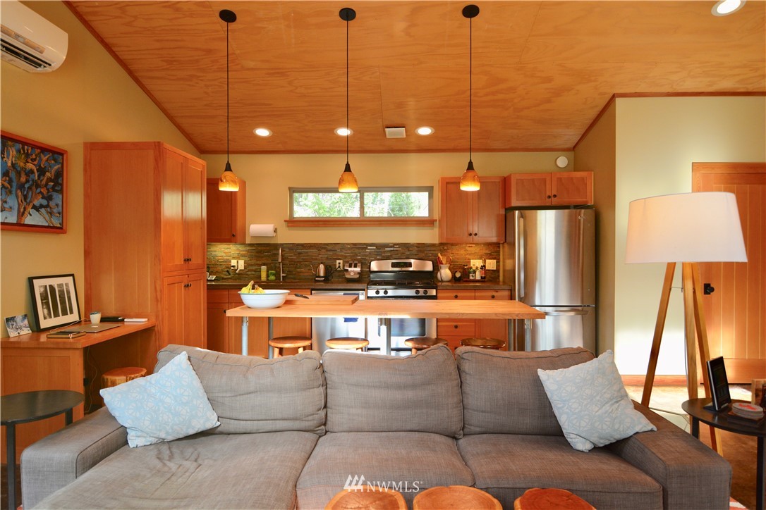16 Littell Road Mazama, WA 98833 - Photo 2 of 21 a living room with furniture and a view of kitchen