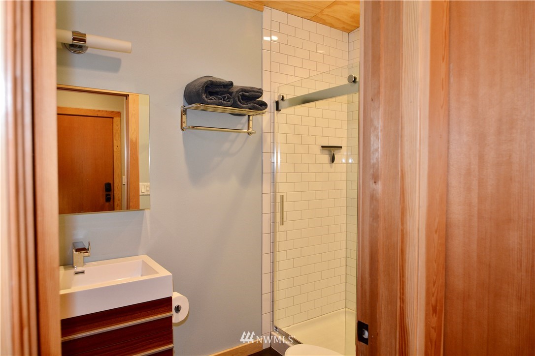 16 Littell Road Mazama, WA 98833 - Photo 13 of 21 a bathroom with a sink and a mirror