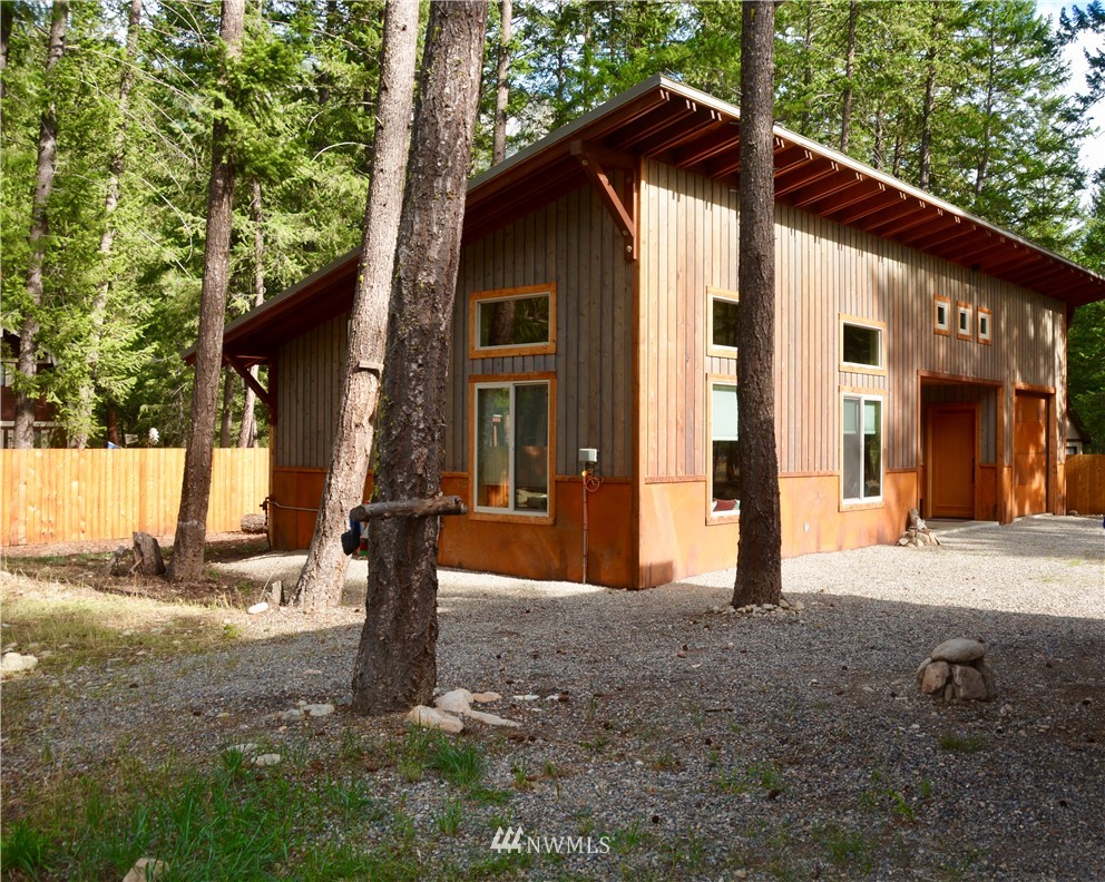 16 Littell Road Mazama, WA 98833 - Photo 19 of 21 a front view of a house with a yard