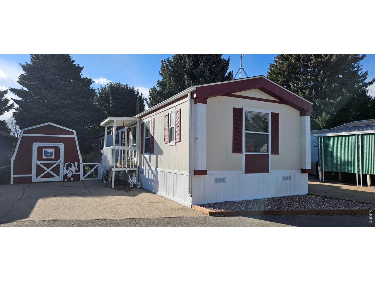 230 North 2nd Street, Unit 59 Berthoud, CO 80513 - Photo 1 of 19 a view of front of a house with a garage