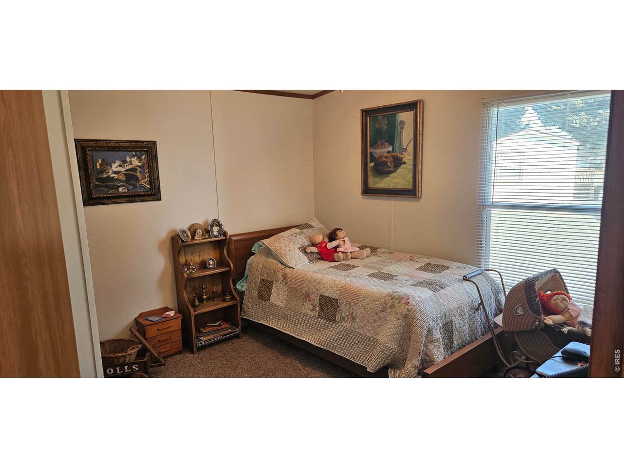 230 North 2nd Street, Unit 59 Berthoud, CO 80513 - Photo 15 of 19 a bedroom with a bed and a desk