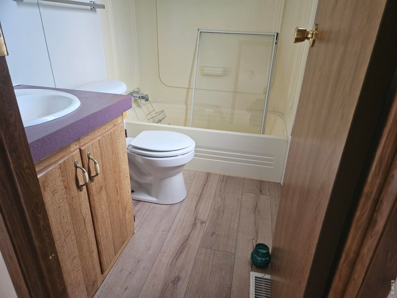 230 North 2nd Street, Unit 59 Berthoud, CO 80513 - Photo 17 of 19 a bathroom with a toilet and a shower