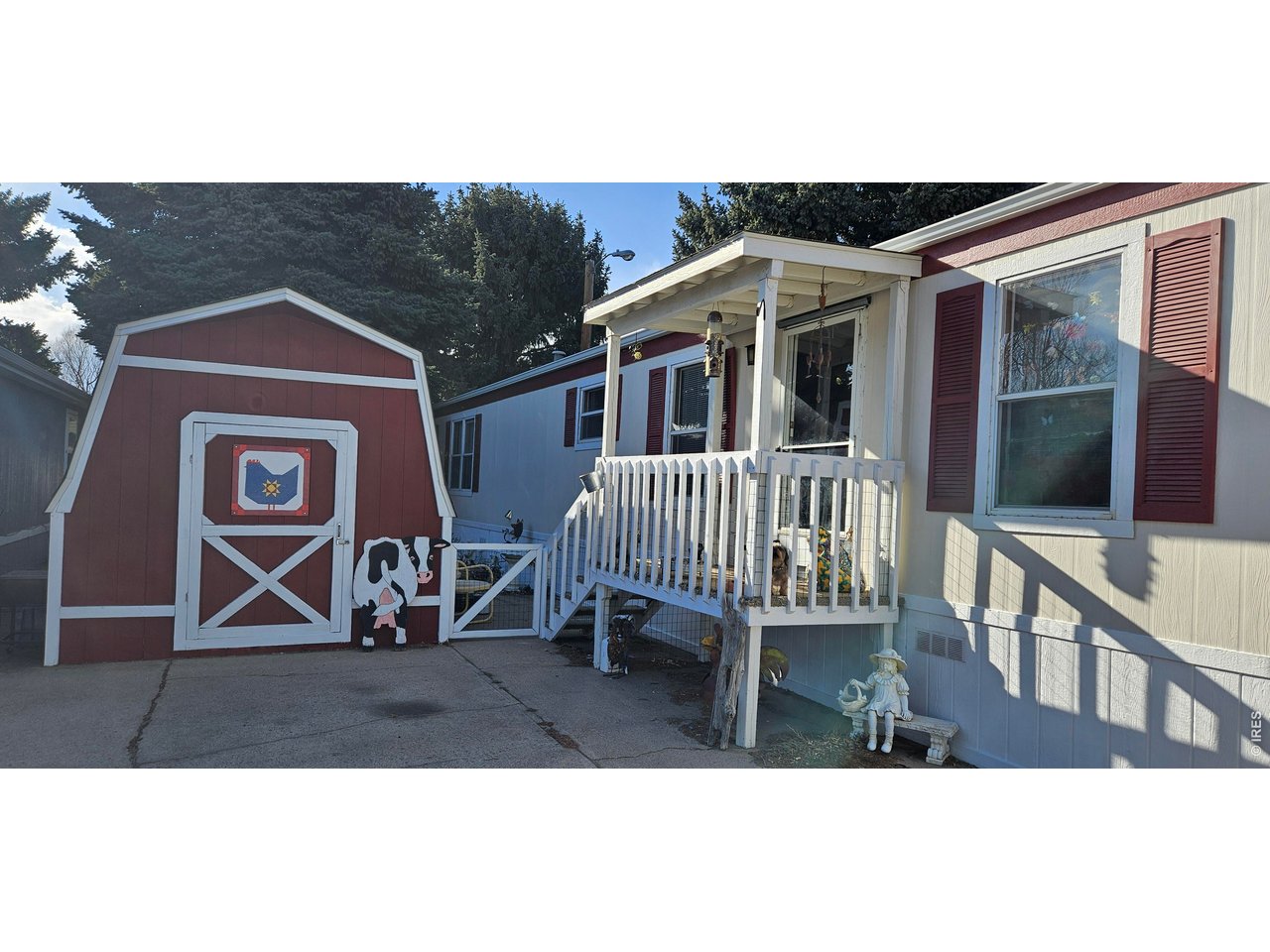 230 North 2nd Street, Unit 59 Berthoud, CO 80513 - Photo 2 of 19 a view of a house with a wooden deck