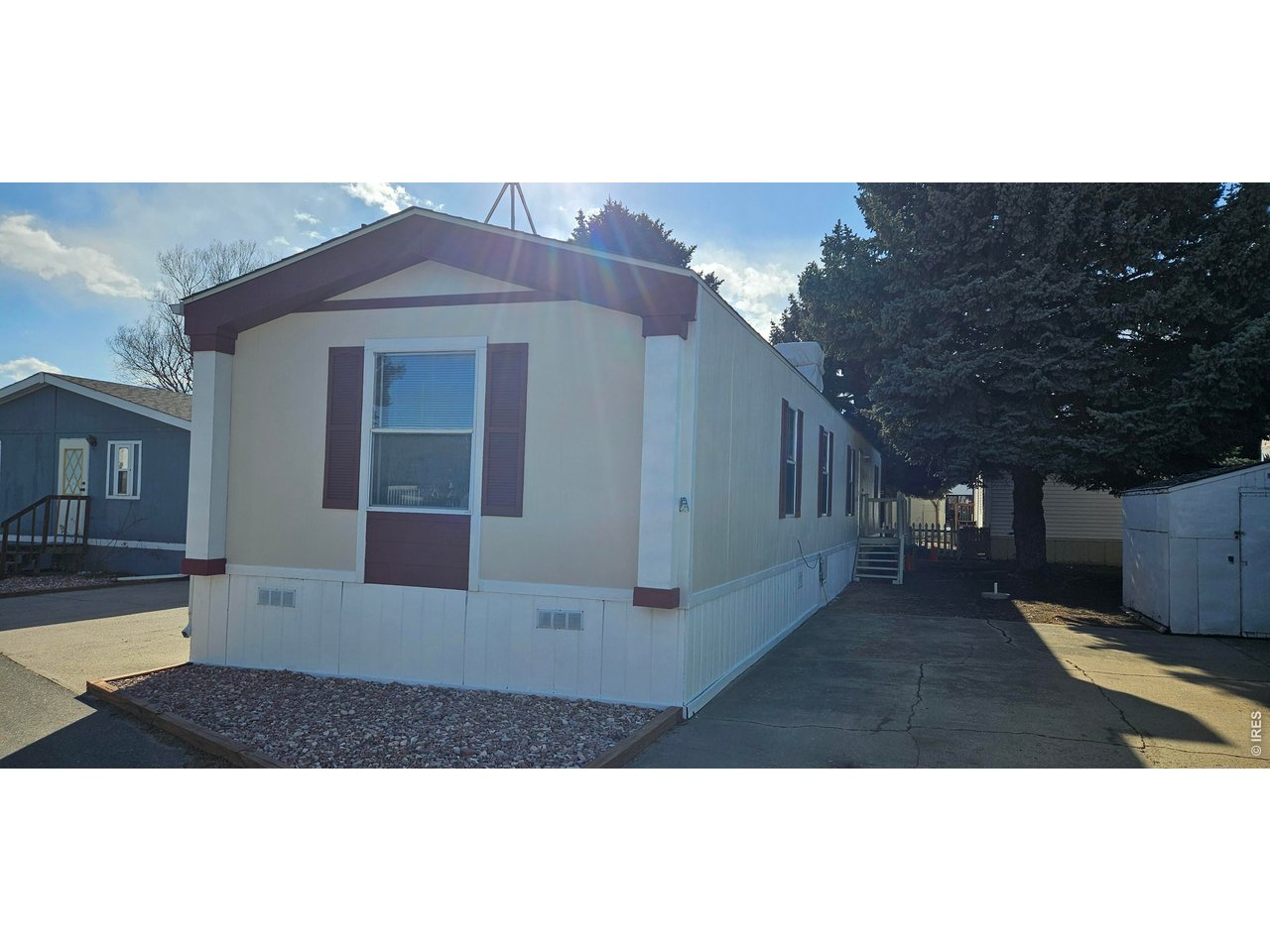 230 North 2nd Street, Unit 59 Berthoud, CO 80513 - Photo 3 of 19 a view of a house with a porch