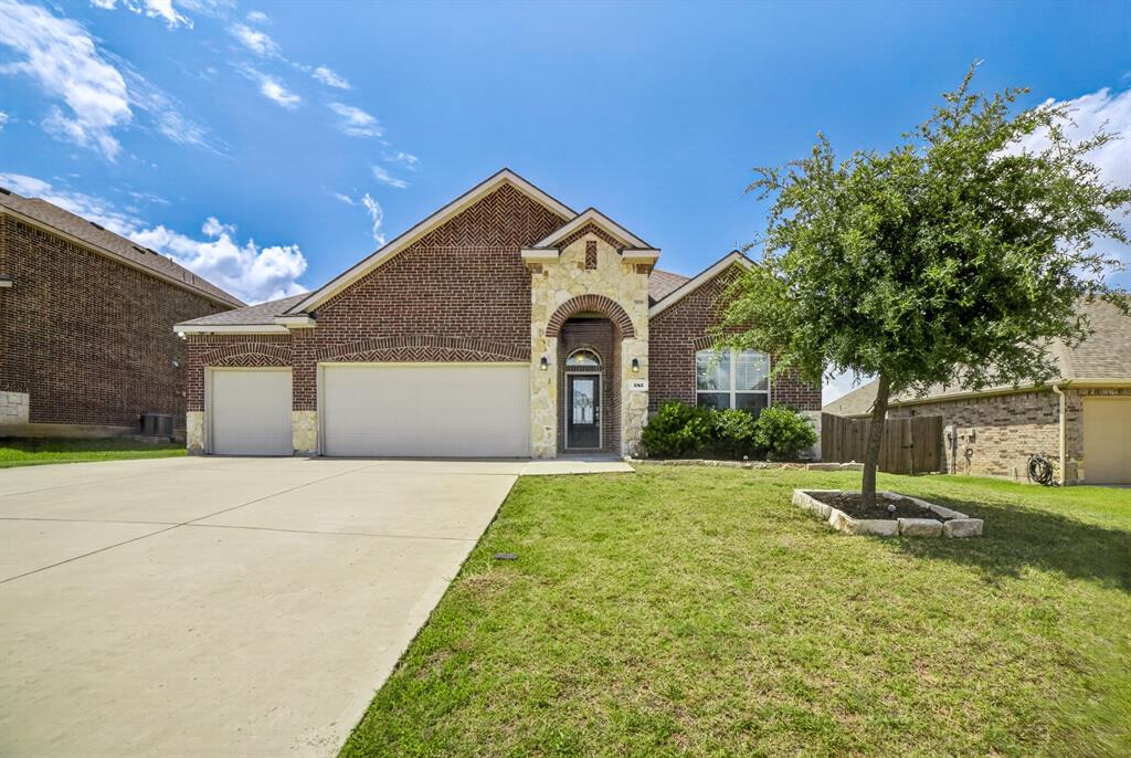 552 Winnetka Drive Oak Point, TX 75068 - Photo 1 of 40 a front view of a house with a yard