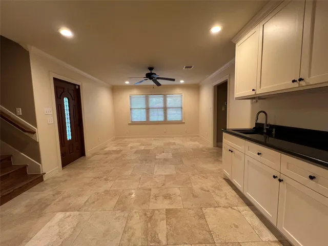 a view of an empty room and window