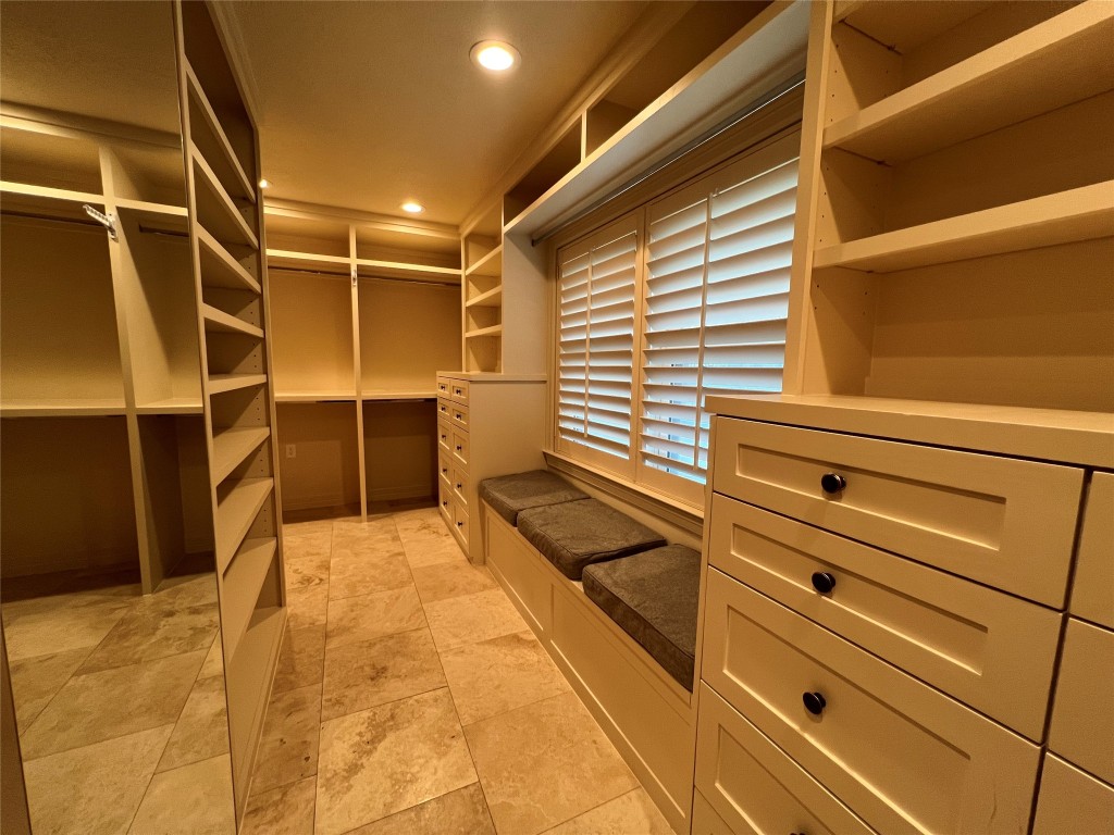 1014 Roxella Street Houston, TX 77076 - Photo 18 of 30 a view of a walk in closet