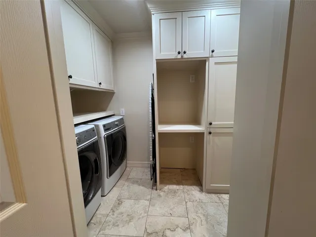 a view of a kitchen with refrigerator and microwave