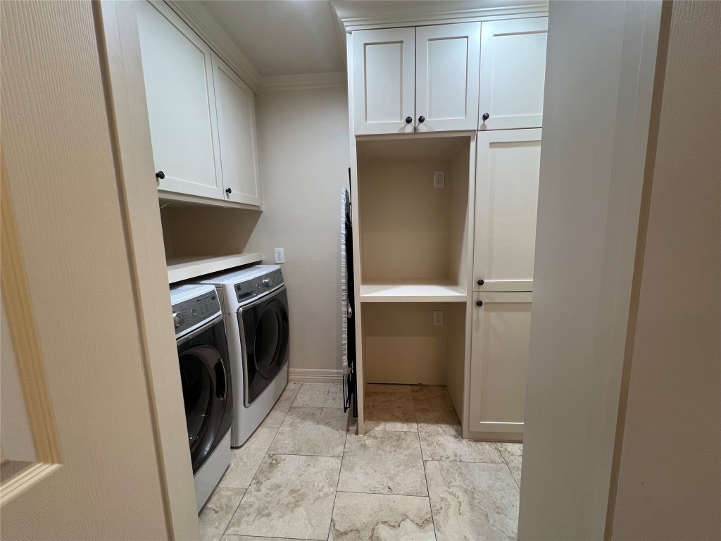1014 Roxella Street Houston, TX 77076 - Photo 9 of 30 a view of a kitchen with refrigerator and microwave