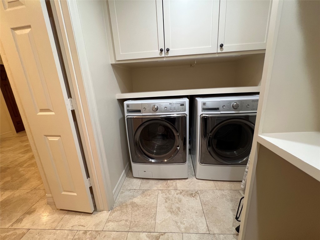 1014 Roxella Street Houston, TX 77076 - Photo 10 of 30 a utility room with dryer and washer