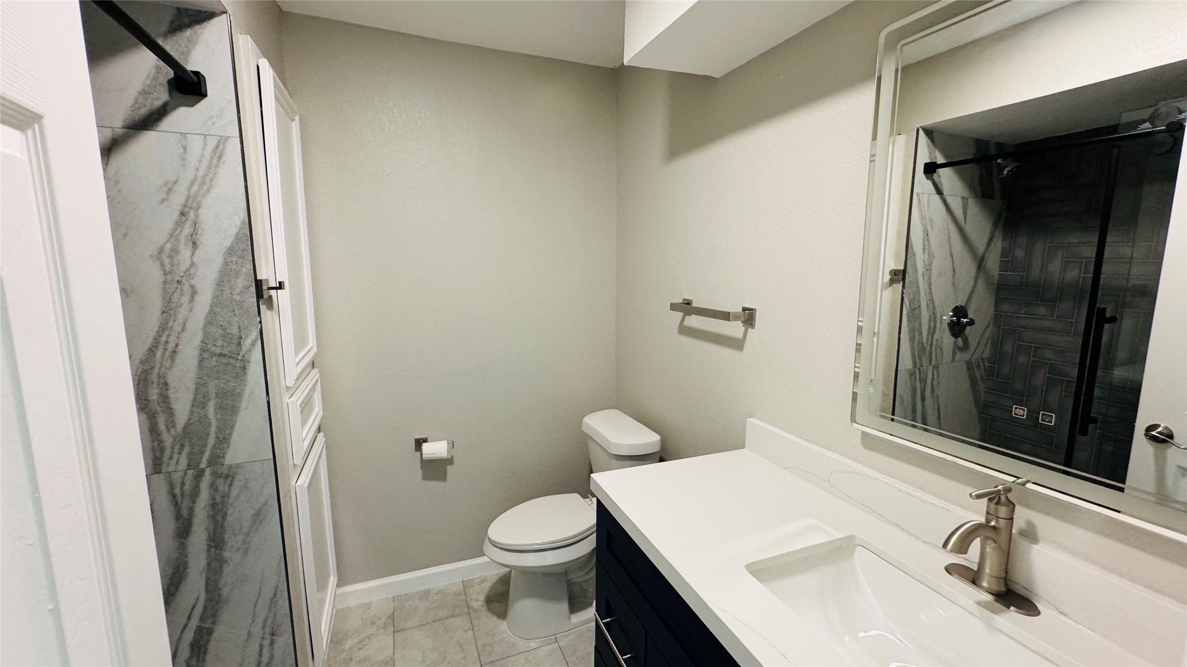 1434 County Road 878A Sweeny, TX 77480 - Photo 24 of 36 a bathroom with a sink and toilet