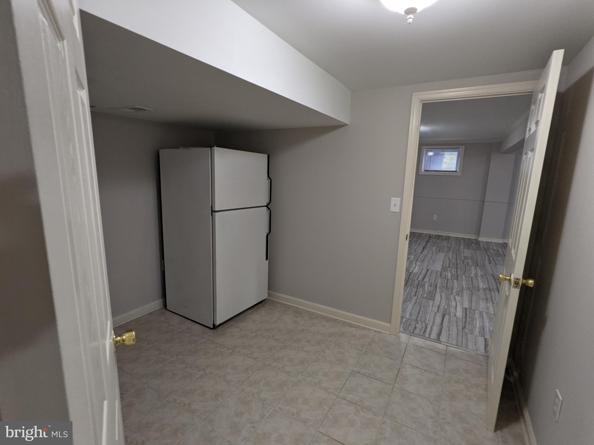 2308 Homestead Drive Silver Spring, MD 20902 - Photo 20 of 23 extra fridge in lower level