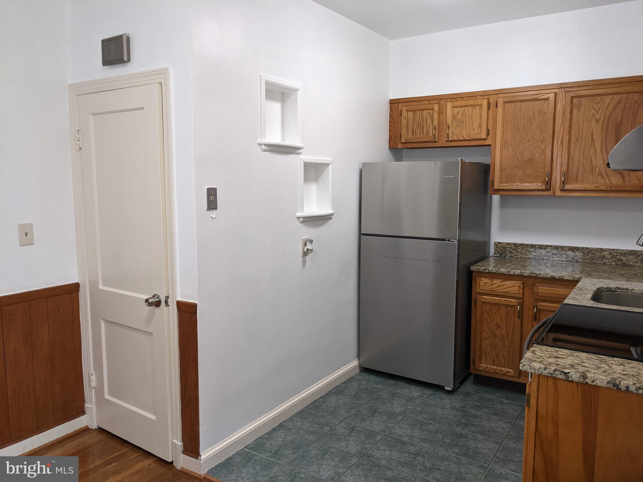 2308 Homestead Drive Silver Spring, MD 20902 - Photo 4 of 23 ceramic flooring in kitchen