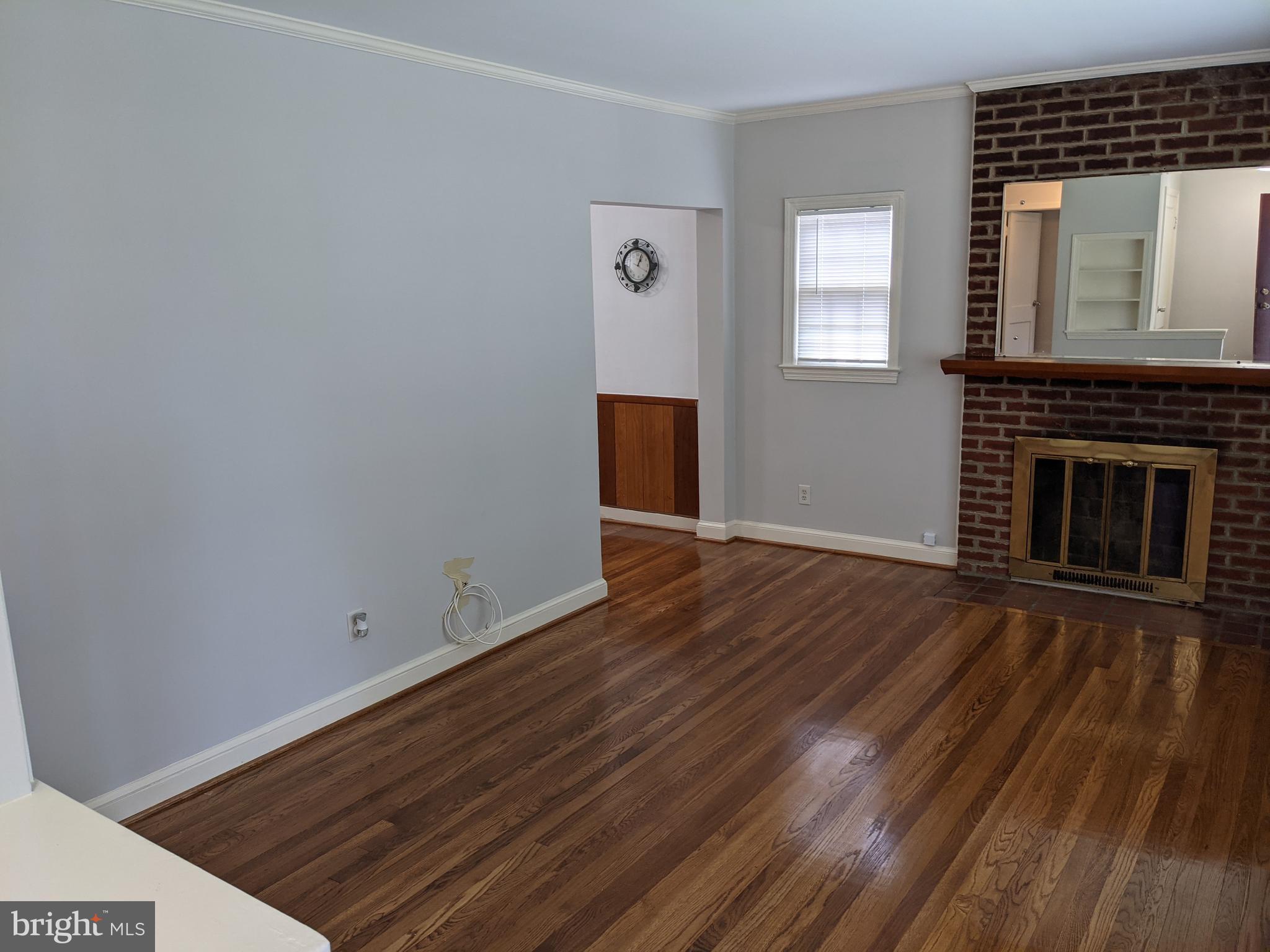 2308 Homestead Drive Silver Spring, MD 20902 - Photo 10 of 23 living room with wood burning fireplace