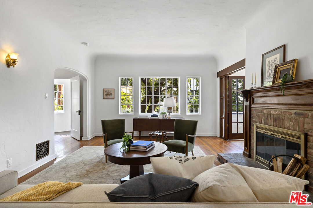 5473 Dahlia Drive Los Angeles, CA 90041 - Photo 7 of 34 a living room with furniture and a fireplace