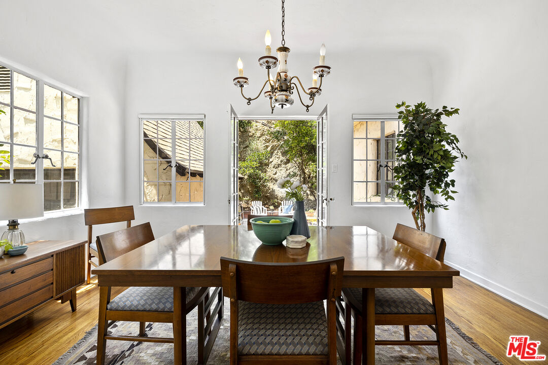 5473 Dahlia Drive Los Angeles, CA 90041 - Photo 10 of 34 a view of a dining room with furniture window and outside view